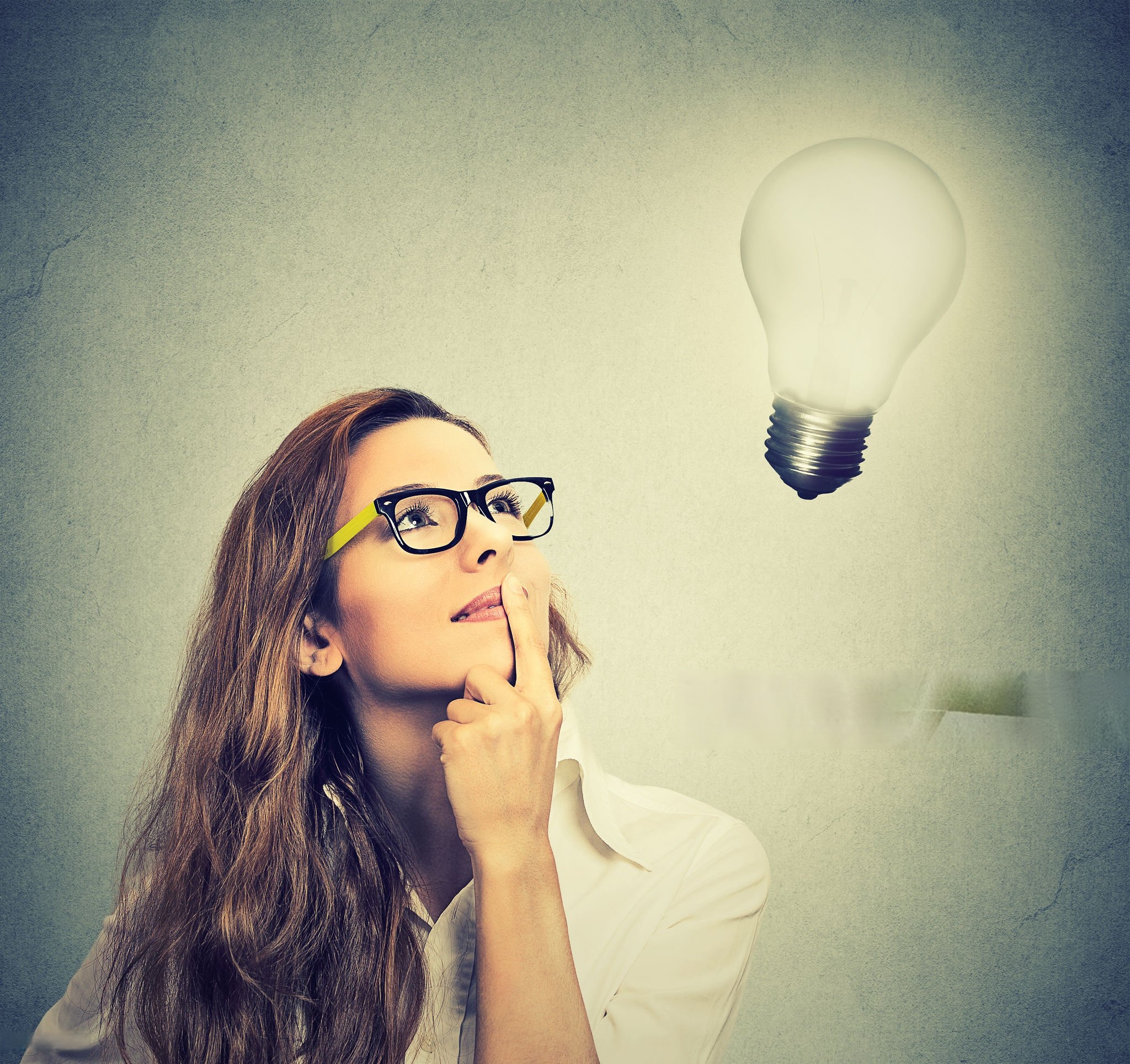 woman thinking with lightbulb going off